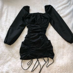 Black runched off-shoulder long sleeve dress